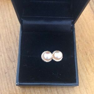 Pair of warm rose warm pearl earrings